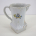 Milchkännchen aus Porzellan mit Blumenmotiv